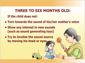 A child looking towards the direction of rattle in his mother's hand in response to the sound.